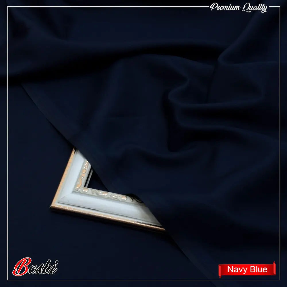Navy blue premium quality fabric draped over ornate vintage picture frame corner